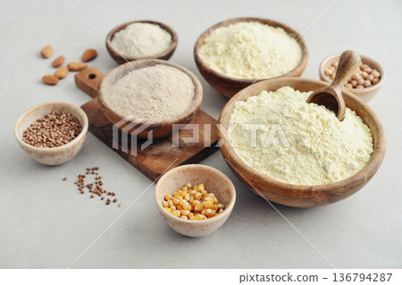 Wooden bowls with different types of gluten free flour Wooden bowls with different types of gluten free flour 136794287