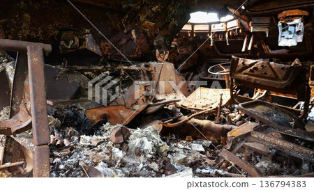 Rusty and burned-out armored vehicles on ukrainian territory. Exhibition of destroyed military equipment of the russian army. War between Ukraine and russia. Close up Slow motion 136794383