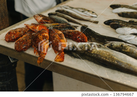 Fresh fish on ice at the traditional fish market. 136794667