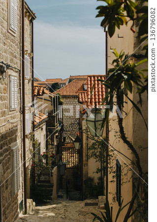 Amazing view of Dubrovnik old town in a sunny day. Travel destination in Croatia. Amazing view of Dubrovnik old town in a sunny day. Travel destination in Croatia. 136796082