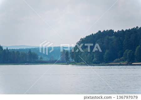 Blue lake with cloudy sky, natural background Blue lake with cloudy sky, natural background 136797079