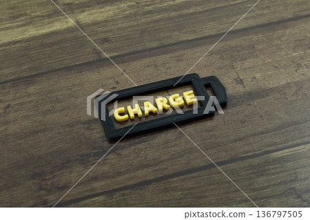 Battery design with prominent charging text Battery design with prominent charging text 136797505