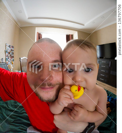 Playful father and baby selfie at home Playful father and baby selfie at home 136797706