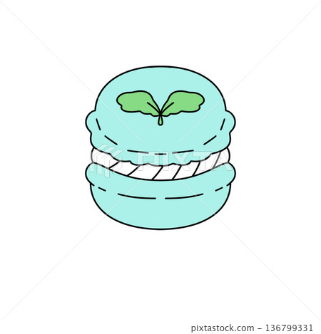 A blue pastry with a green leaf on top 136799331