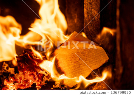 The instant the paper money burned fiercely inside the incense burner The instant the paper money burned fiercely inside the incense burner 136799950
