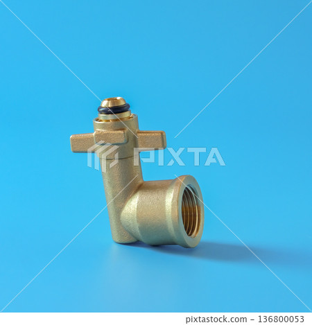 Brass fittings for gas cylinders on color background. 136800053