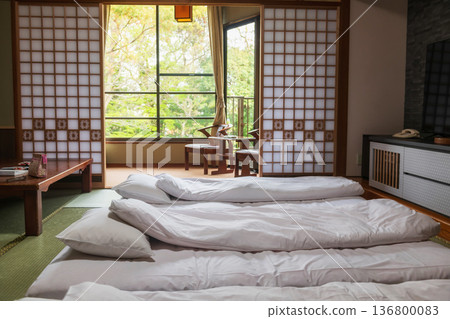 Traditional Japanese tatami mattress bedroom in ryokan 136800083