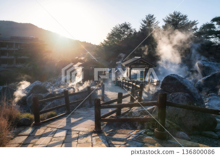 Mount Unzen Hell valley Jigoku with sulfur gas steam at sunset, Nagasaki Mount Unzen Hell valley Jigoku with sulfur gas steam at sunset, Nagasaki 136800086