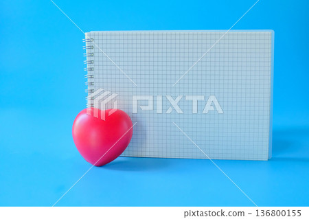 Red heart and booknote on background. 136800155