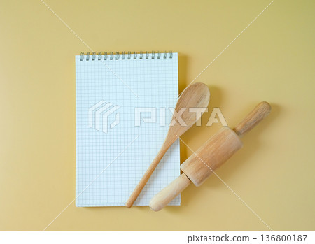 Blank recipe book with rolling pin and spoon. Blank recipe book with rolling pin and spoon. 136800187
