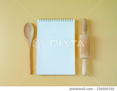 Blank recipe book with rolling pin and spoon. 136800188
