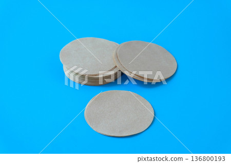 Coffee filter paper for Moka pot on color background. Coffee filter paper for Moka pot on color background. 136800193