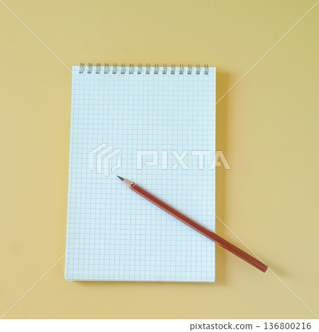 A pencil with a book on a color background. A pencil with a book on a color background. 136800216