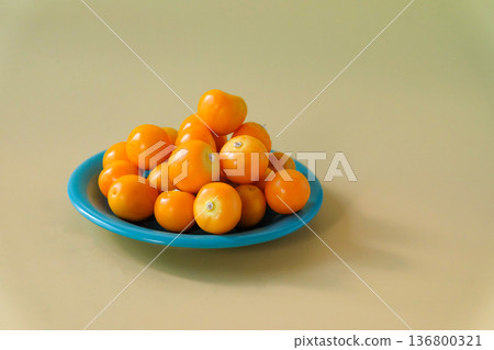Fresh Cape Gooseberry on color background. Fresh Cape Gooseberry on color background. 136800321