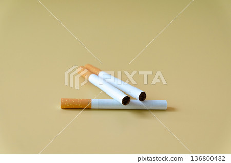 Cigarette with color background,Health concept. Cigarette with color background,Health concept. 136800482