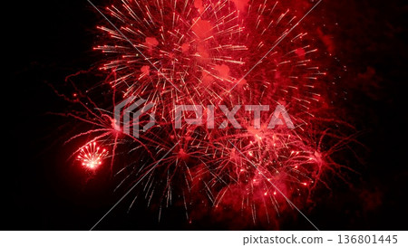 bright night display, colorful fireworks light up darkness, vibrant pyrotechnic show energizes and illuminates night scene, dazzling display of fireworks energizes and colors night with dynamic bursts 136801445