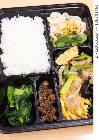 Delicious Chinese bento with fried pork and eggs Delicious Chinese bento with fried pork and eggs 136801463