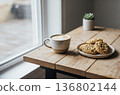 Cafe latte and cookies on a wooden table | Cafe time at home by the window 136802144