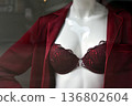 closeup of red bra on mannequin in fashion store showroom for women 136802604