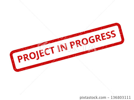Distressed red rectangular stamp impression signifying a project is in progress, indicating active work and ongoing development 136803111