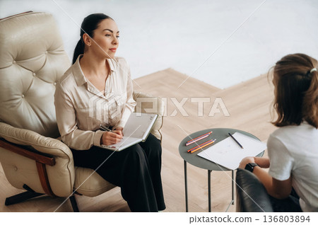 Girl at a psychologist's appointment Girl at a psychologist's appointment 136803894