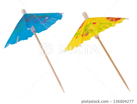 Cocktail Umbrella on Stick isolated on white background. Blue yellow color umbrellas 136804277