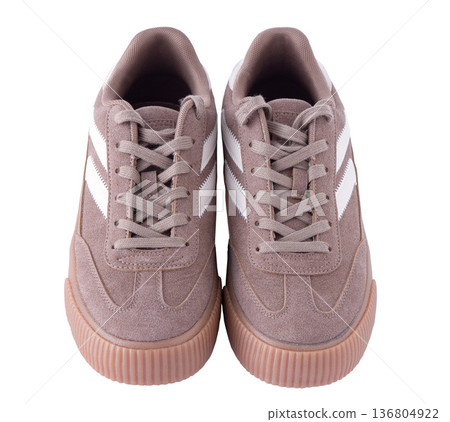 Sneakers isolated on white background. Shoes suede light brown beige cut out Sneakers isolated on white background. Shoes suede light brown beige cut out 136804922