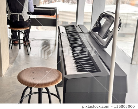 A stylish modern synthesizer for musicians is located indoors 136805000