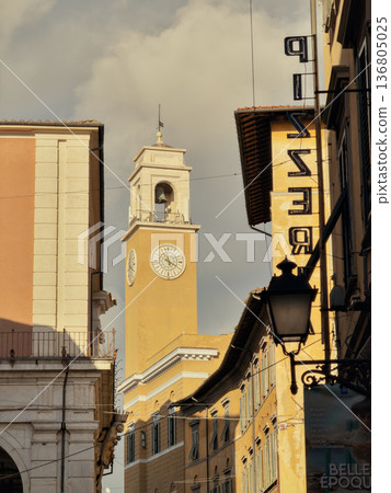Sunlit Mediterranean Clock Tower Alley Architectural Travel Scene Sunlit Mediterranean Clock Tower Alley Architectural Travel Scene 136805025