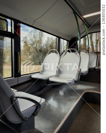 Silent Early Morning Setting In Commuter Bus With Shiny Flooring Silent Early Morning Setting In Commuter Bus With Shiny Flooring 136805032