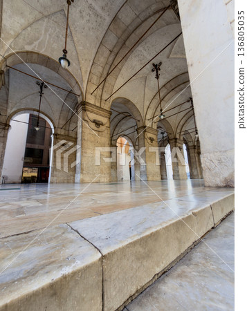 Elegant Vaulted Arcade Reflecting Warm Glow On Smooth Stone Surfaces Elegant Vaulted Arcade Reflecting Warm Glow On Smooth Stone Surfaces 136805035