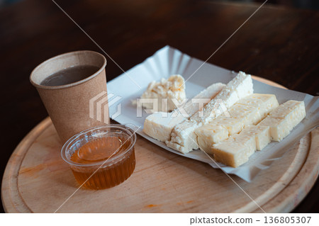 Traditional Cheese and Honey Snack with Hot Drink Traditional Cheese and Honey Snack with Hot Drink 136805307