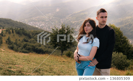 Young Couple Sharing an Intimate Moment in the Mountains Young Couple Sharing an Intimate Moment in the Mountains 136805309