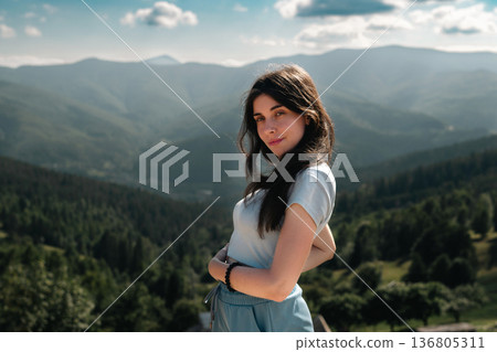Young Woman Enjoying Mountain View in Summer 136805311