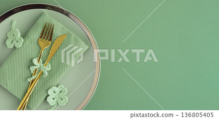 Saint Patrick Day Table Setting with Clover Decor. Festive Green Arrangement 136805405