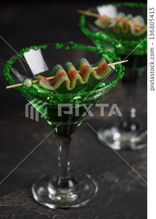 Green Cocktails with Rainbow Candy and Shamrocks. Festive St. Patricks Day Celebration Still Life Green Cocktails with Rainbow Candy and Shamrocks. Festive St. Patricks Day Celebration Still Life 136805415