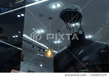 Mannequin with Cap in Storefront Display Mannequin with Cap in Storefront Display 136805529