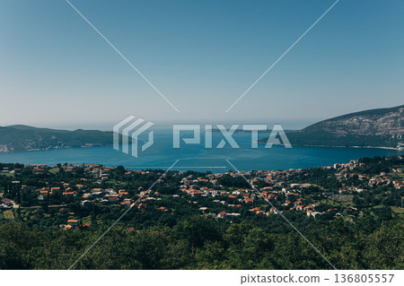 Amazing view of Herceg Novi city and the sea in a sunny day. Travel destination in Montenegro. Amazing view of Herceg Novi city and the sea in a sunny day. Travel destination in Montenegro. 136805557