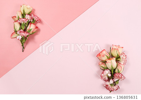 Arrangement of flowers on a pink isolated background, place for text, flat lay. Creative modern bouquet, minimal holiday and spring concept. Greeting card for Women's Day or Valentine's Day, happy Arrangement of flowers on a pink isolated background, place for text, flat lay. Creative modern bouquet, minimal holiday and spring concept. Greeting card for Women's Day or Valentine's Day, happy 136805631