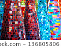 Colored glass vases with red, blue and multicolored mosaic. Art exhibition on the Christmas market. Handmade vase for interior. 136805806