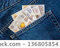 Jeans with british pound money. United Kindom bills in the pants pocket for commerce concept. 136805854