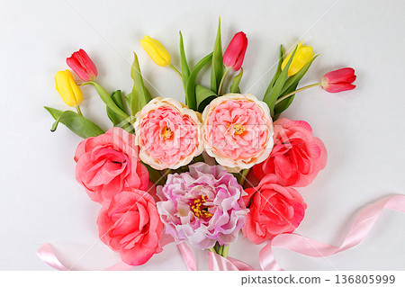 Spring or summer flower composition, still life, banner, minimal holiday concept. Greeting card for mother's day, women's day, valentine's day, happy birthday, wedding, selective focus, gift for loved Spring or summer flower composition, still life, banner, minimal holiday concept. Greeting card for mother's day, women's day, valentine's day, happy birthday, wedding, selective focus, gift for loved 136805999