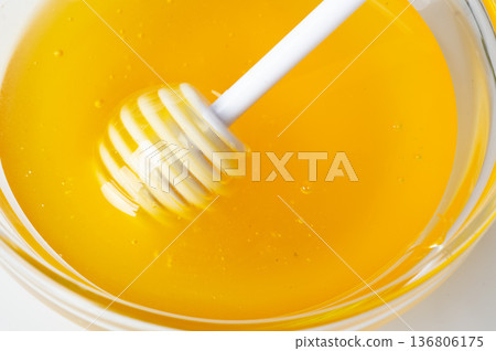 linden fresh honey with spoon on white table. macro shot.  top view 136806175