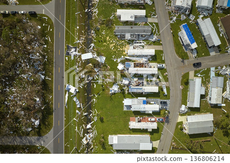 Destroyed by hurricane Ian suburban houses in Florida mobile home residential area. Consequences of natural disaster Destroyed by hurricane Ian suburban houses in Florida mobile home residential area. Consequences of natural disaster 136806214