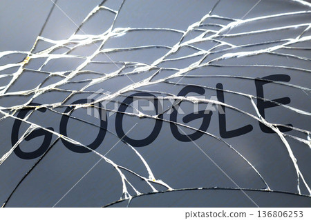Broken cracked glass with word "Google" on it. Broken cracked glass with word "Google" on it. 136806253