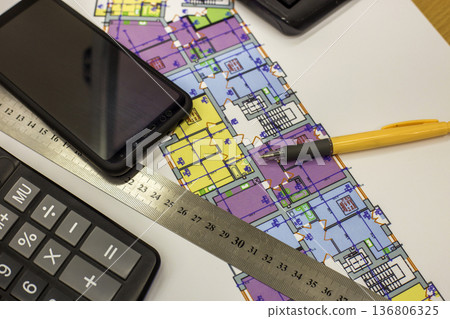Calcurator, pen and ruler on building house architecture plan drawing blueprint. Planning, measurement and investments concept. 136806325