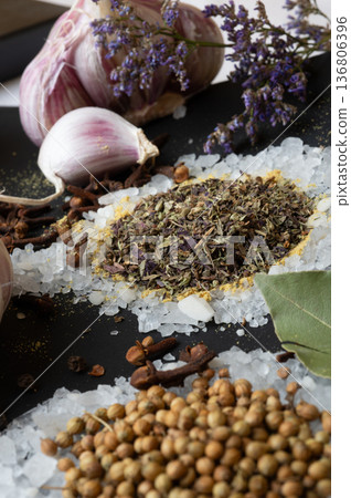 Spices and seeds served  in salt spoon at black background. seasonings, Colorful natural meal additives. healthy food concept.  close up 136806396