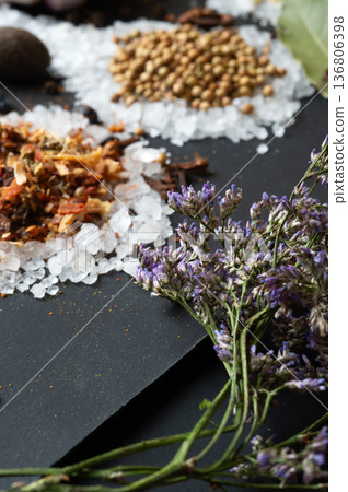 seasonings background with salt, Spices  served  at black. Colorful natural meal additives. healthy food concept.  macro shot 136806398