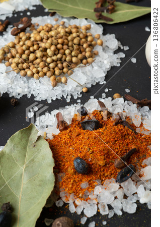 seasonings background with salt and Spices served at black. Colorful natural meal additives. healthy food concept. macro shot seasonings background with salt and Spices served at black. Colorful natural meal additives. healthy food concept. macro shot 136806422