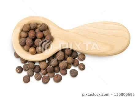 Allspice pepper in wooden spoon isolated on white background. Jamaica pepper, Pimenta dioica or myrtle pepper. Top view Allspice pepper in wooden spoon isolated on white background. Jamaica pepper, Pimenta dioica or myrtle pepper. Top view 136806695
